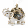 Bruciatore d'incenso a elefante 30 x 16 x 25 cm in ceramica bianca blu e oro traforata